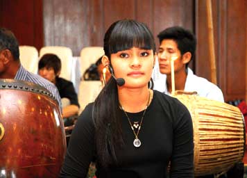 Young soprano Bosbapanh in rehearsal for the weekend’s concert at Bayon Temple, billed as Tribute to the Masters.